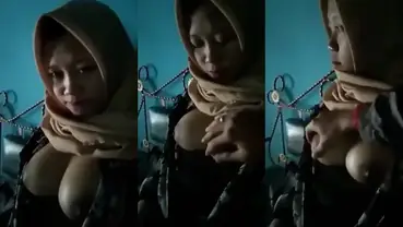 Bokep Jilbab ABG Pasrah Dada Diremas Keras poster